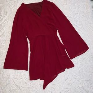 Red romper in red shorts with elastic waist